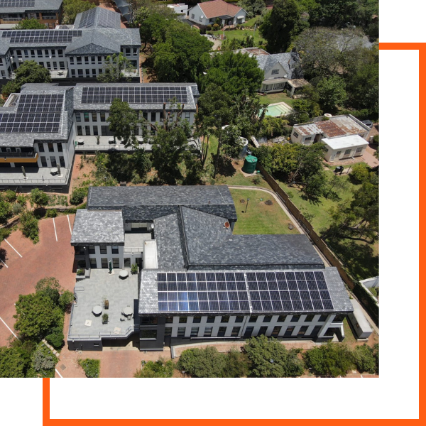 Solar panels across commercial building rooftops